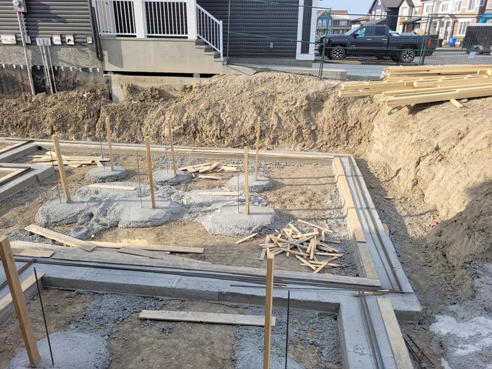 Calgary building Demolition, Calgary Excavation & Trenching, Calgary Landscaping, Calgary Retaining Walls & Patio Stones